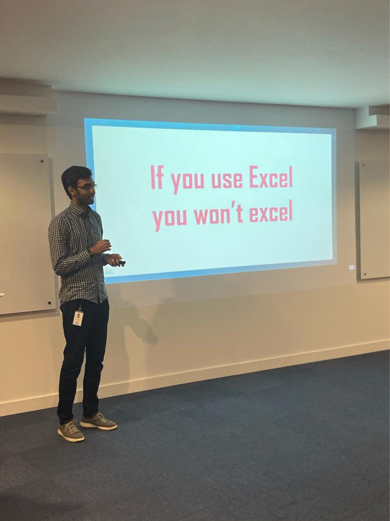 Aazim speaking at the inaugural Alteryx Dubai User Group, in front of a slide reading 'If you use Excel you won't excel'